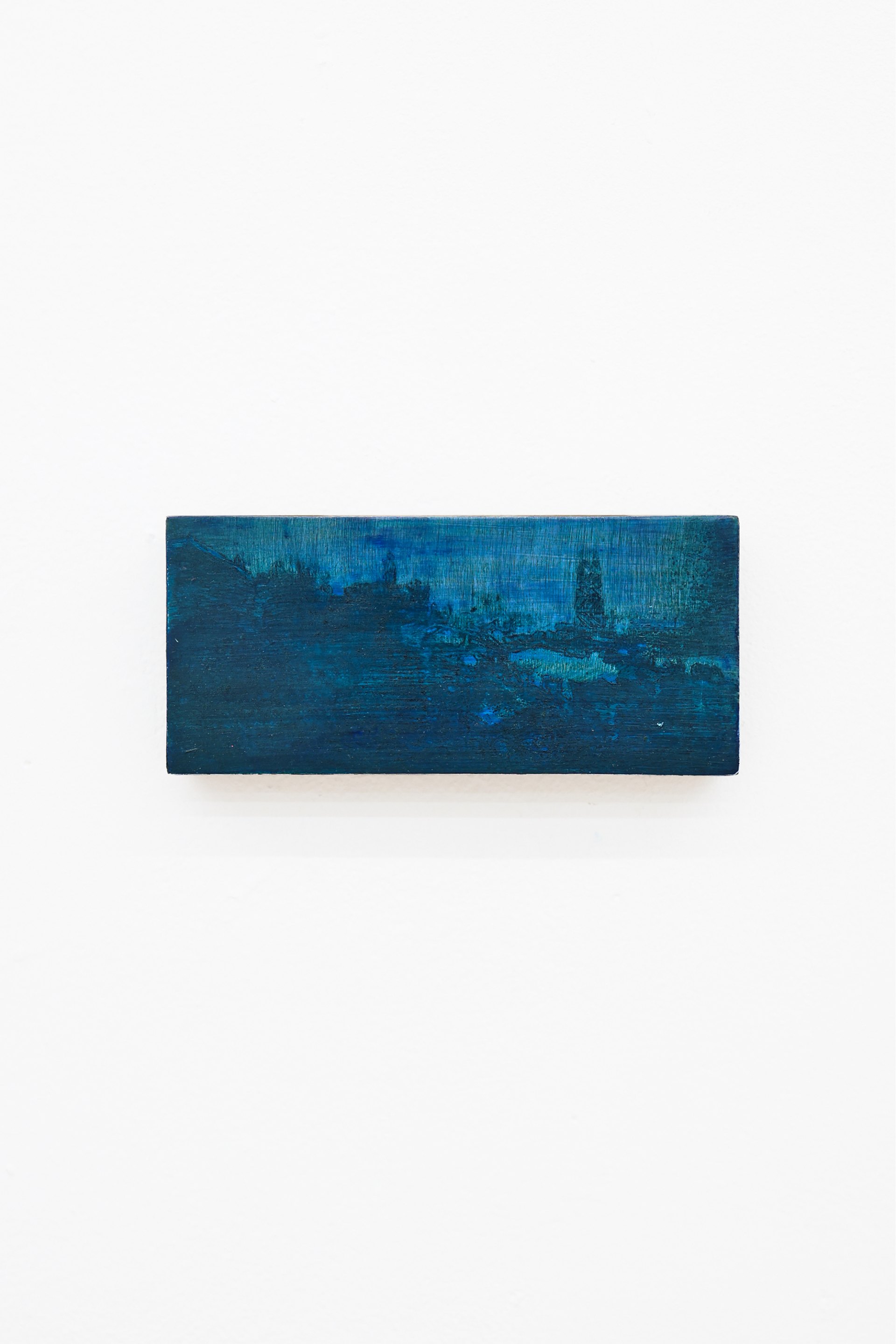 Mtatsminda Turn 10. Deep-blue nocturne on an oak block, a faint skyline and tower dissolving into atmospheric blue haze.