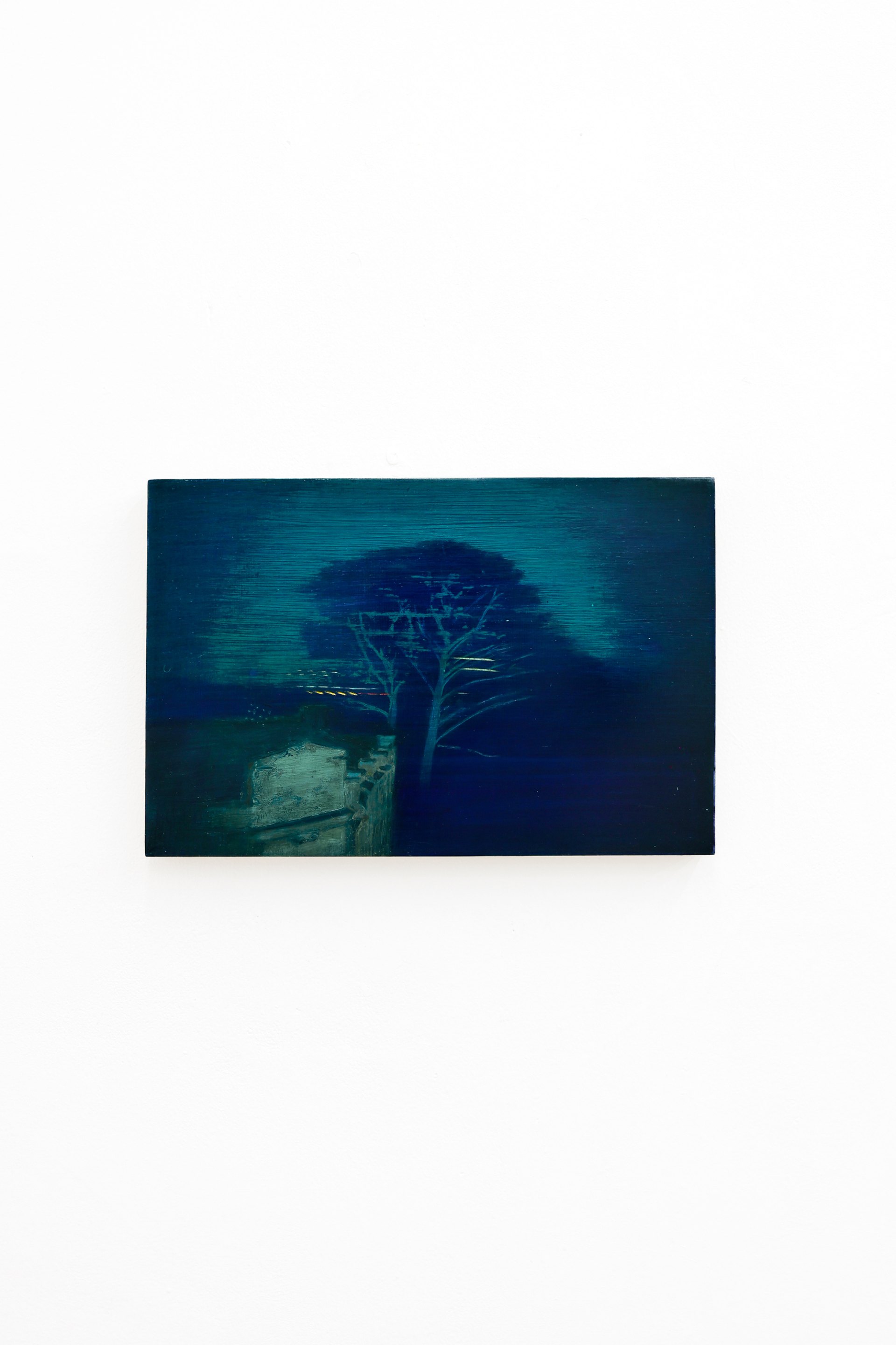 Mtatsminda Turn 15. Teal and blue-green nocturne on an oak block, a bare tree silhouetted over a pale building, with faint golden lights in the distance.