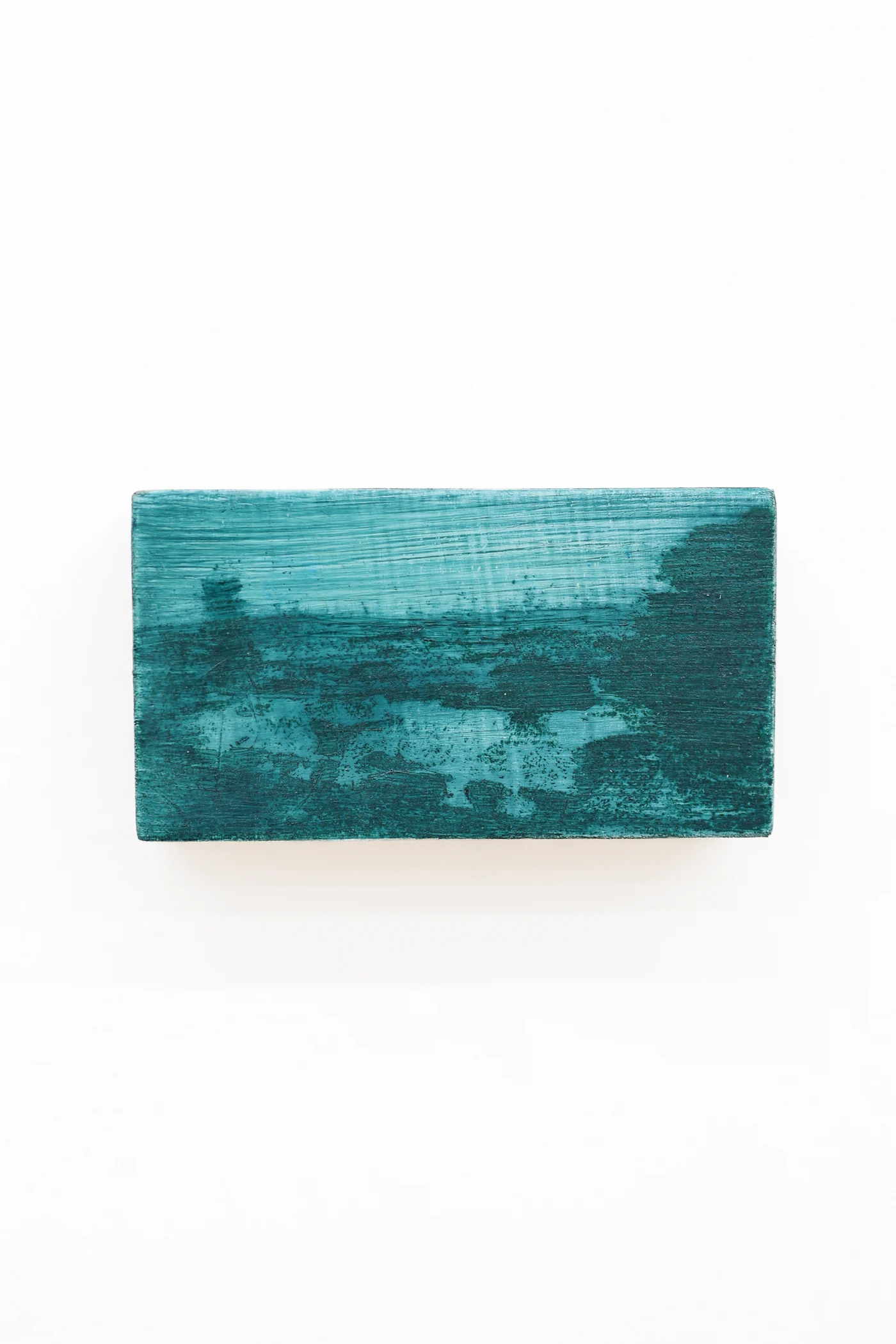 Mtatsminda Turn 4. Small horizontal painting on an oak block, a hazy field of deep teal and emerald green.