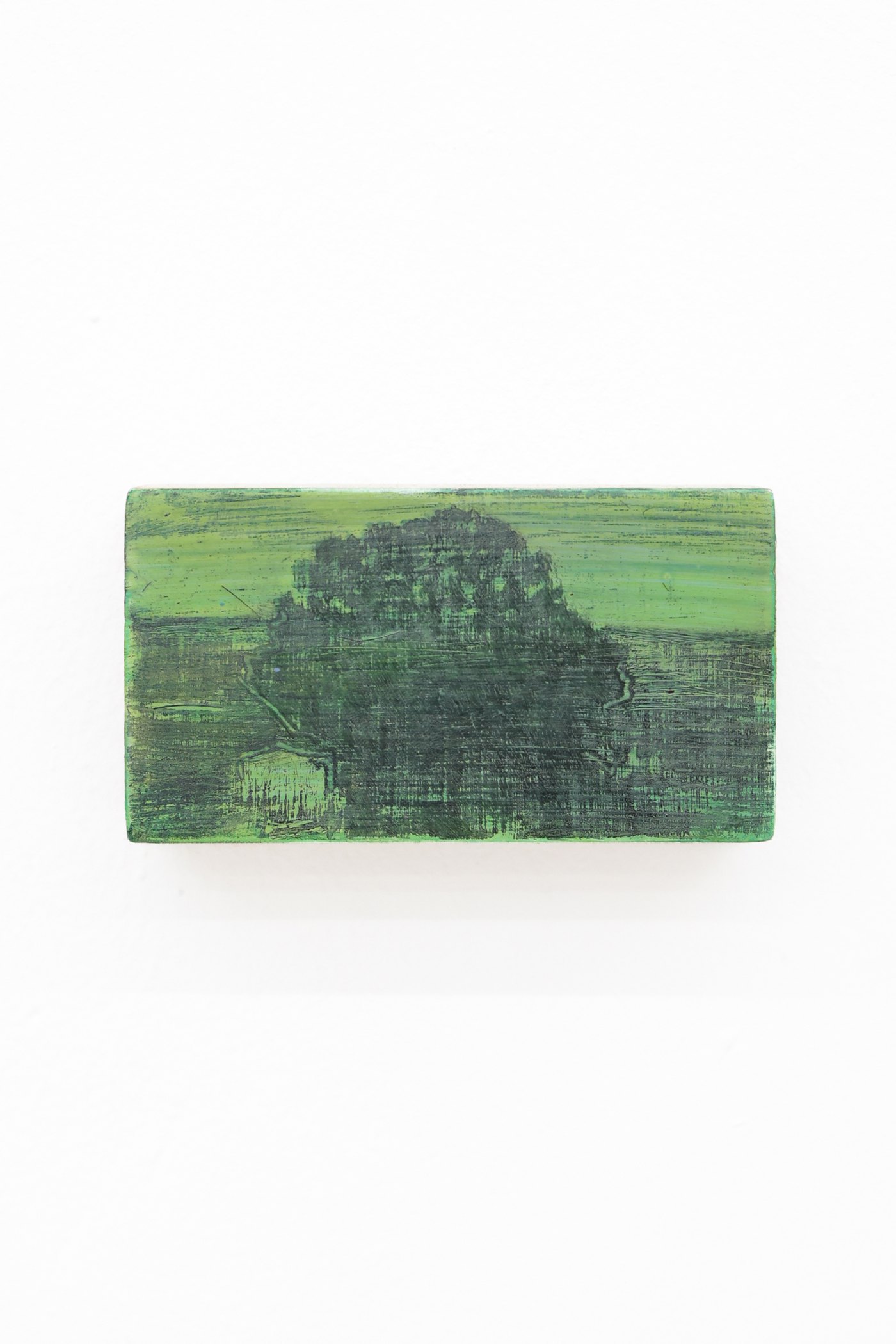 Mtatsminda Turn 6. Small horizontal painting on an oak block, a dark tree-like mass against a green field.