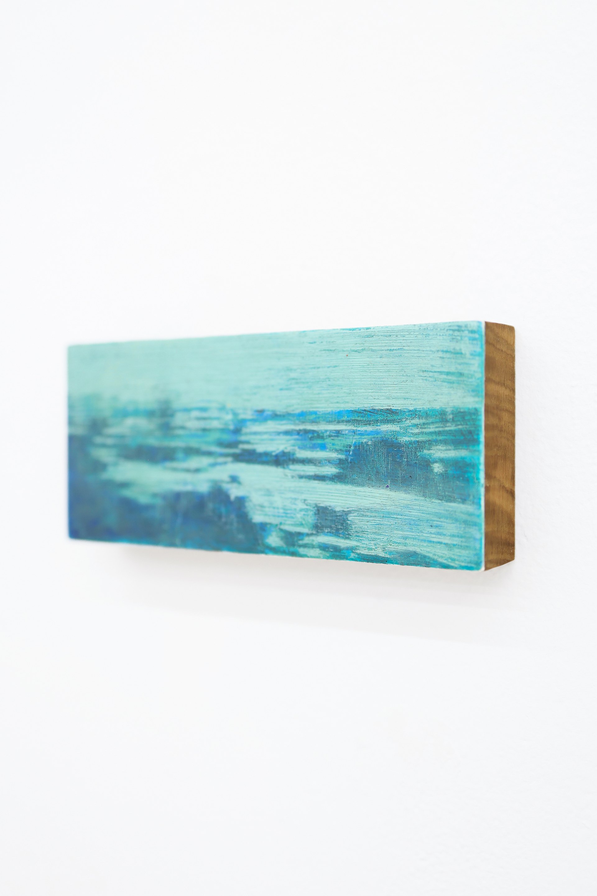 Mtatsminda Turn 9. Angled view showing the work painted on a thick oak block, mounted on a white wall.