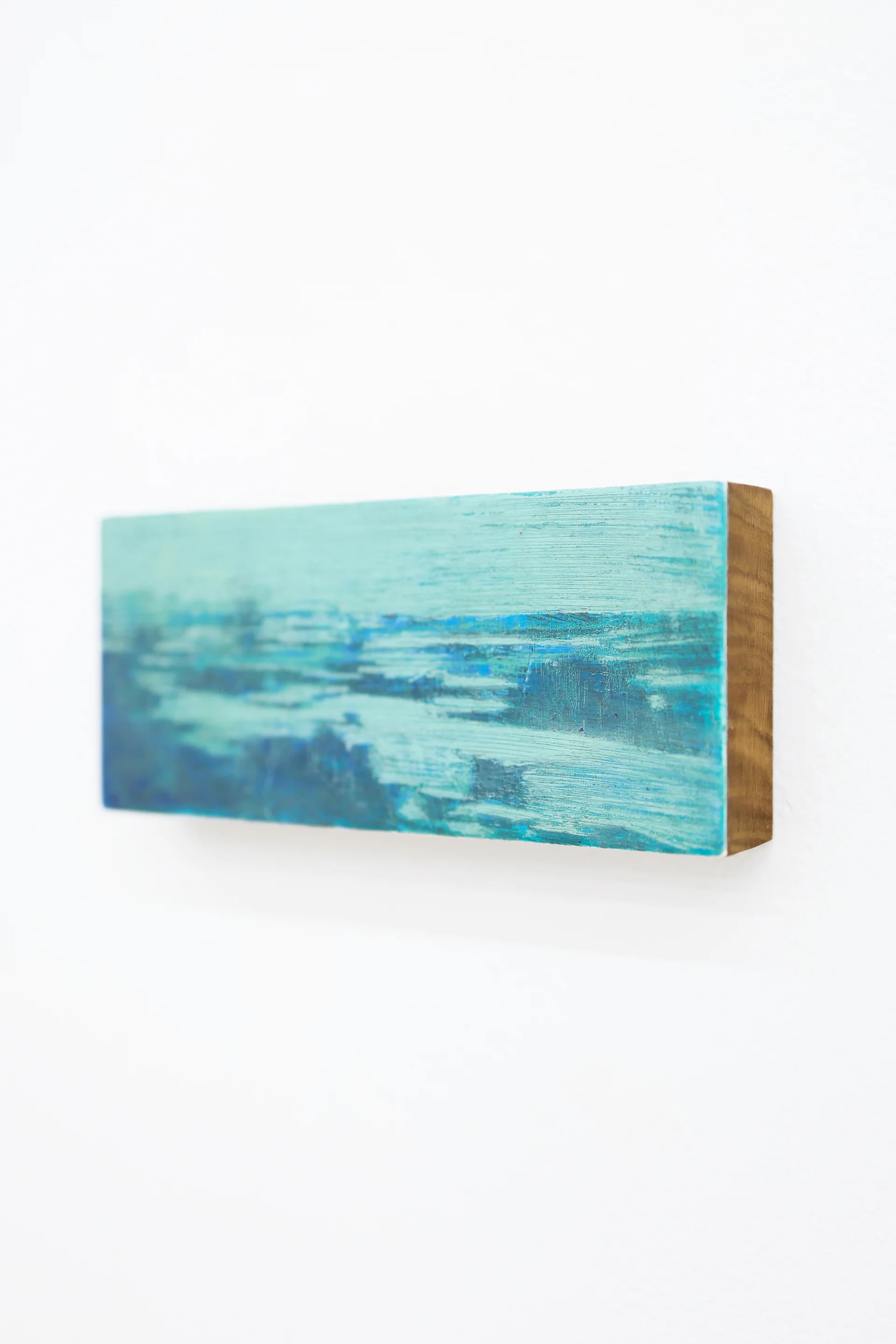 Mtatsminda Turn 9. Angled view showing the work painted on a thick oak block, mounted on a white wall.