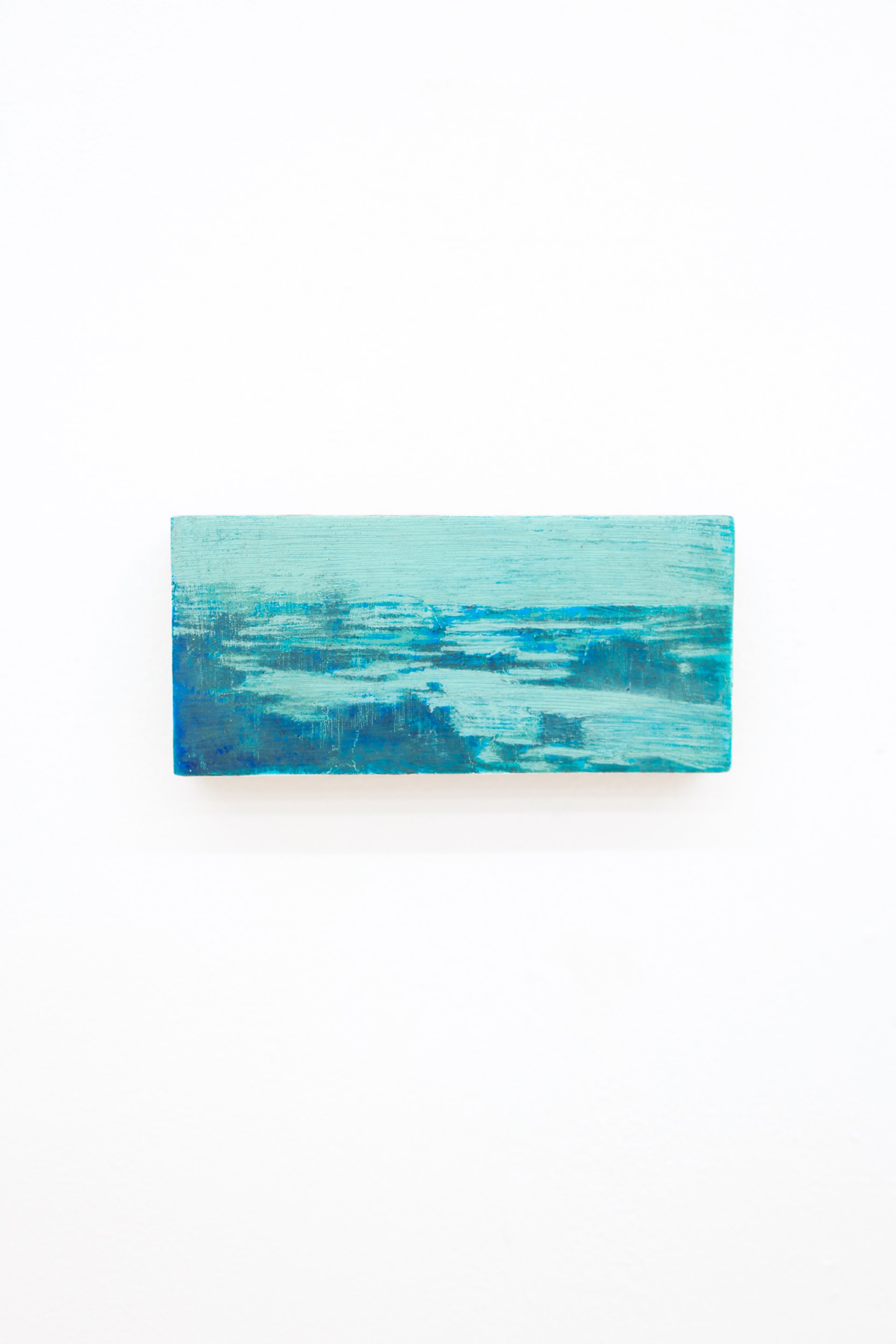 Mtatsminda Turn 9. Abstract oil on an oak block, a turquoise haze over a band of blue and teal marks suggesting a distant shoreline.