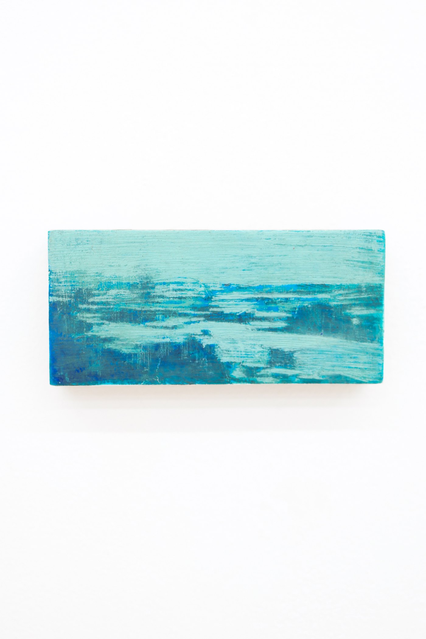Mtatsminda Turn 9. Small abstract oil painting on an oak block, layered turquoise and deep-blue strokes evoking a hazy seascape.