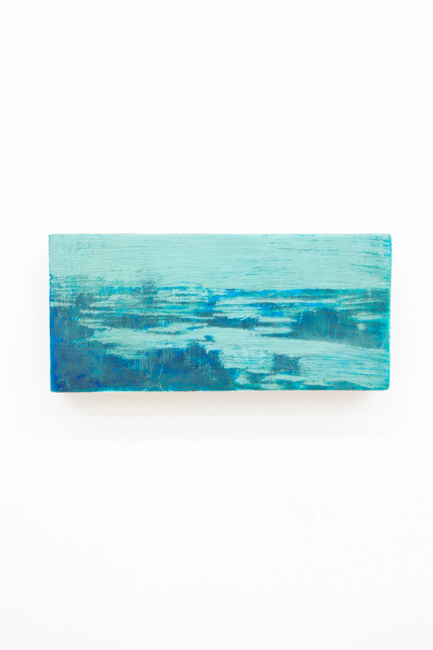 Mtatsminda Turn 9. Small abstract oil painting on an oak block, layered turquoise and deep-blue strokes evoking a hazy seascape.